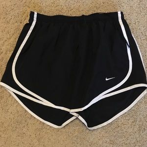 Women’s black Nike running shorts
